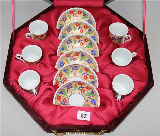 Two sets of ambers beads and a cased coffee set